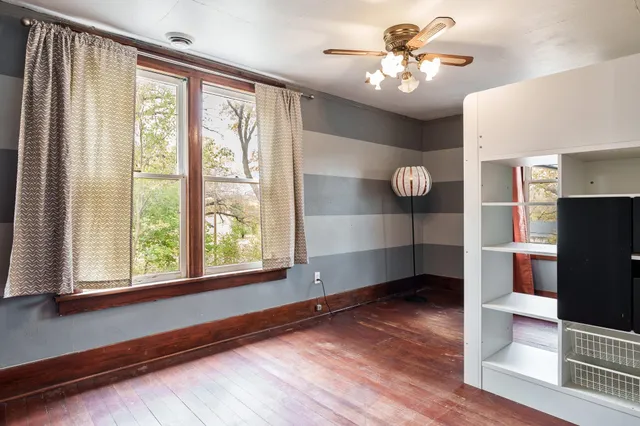 a view of a livingroom with furniture and chandelier