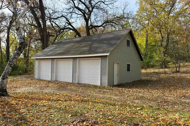 a view of a yard with trees