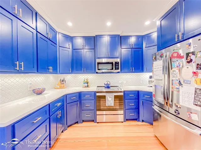 a view of a bathroom with a sink and a window