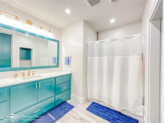 a view of a house with a stairs and backyard of the house