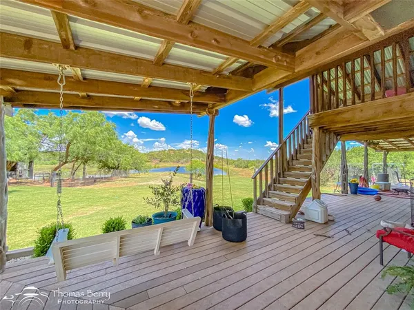 a view of a house with a big yard