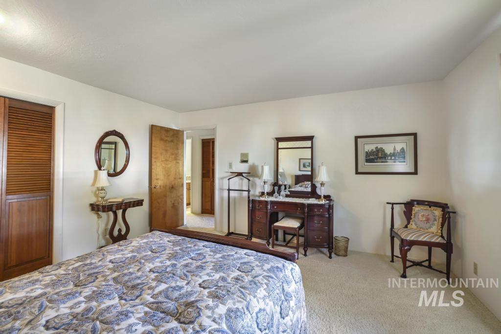 2018 Rancho Vista Drive Twin Falls, ID 83301 - Photo 29 of 50 Cream-colored walls frame a bedroom space featuring a carpeted floor