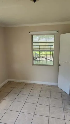 a view of an empty room and window