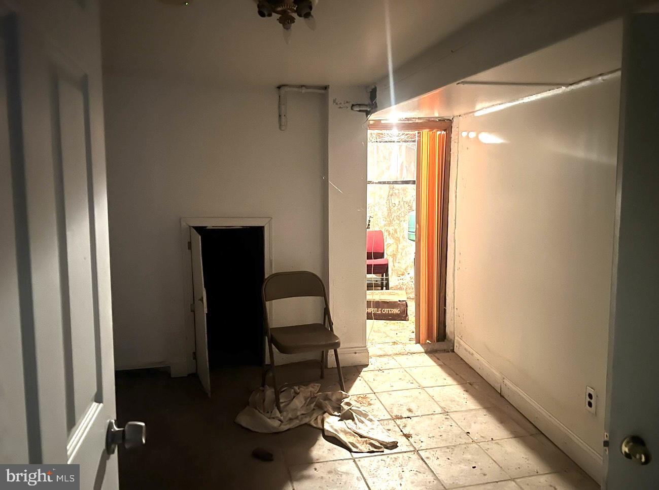 2432 4th Street Northeast Washington, DC 20002 - Photo 13 of 15 a room with furniture and a window