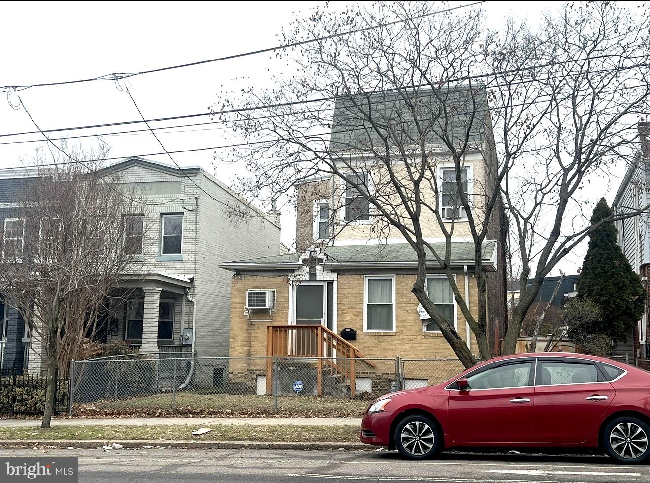 2432 4th Street Northeast Washington, DC 20002 - Photo 2 of 15 a front view of a house with a yard