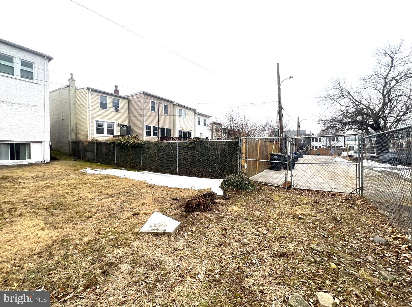 2432 4th Street Northeast Washington, DC 20002 - Photo 4 of 15 a large white building with a yard
