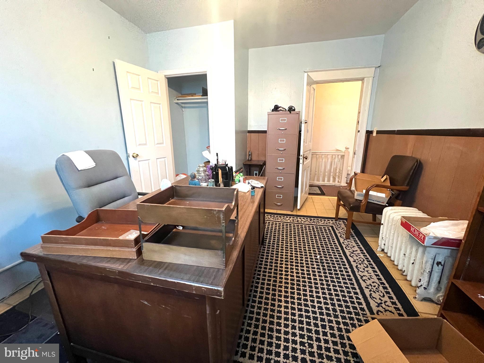 2432 4th Street Northeast Washington, DC 20002 - Photo 10 of 15 a bedroom with furniture and a window