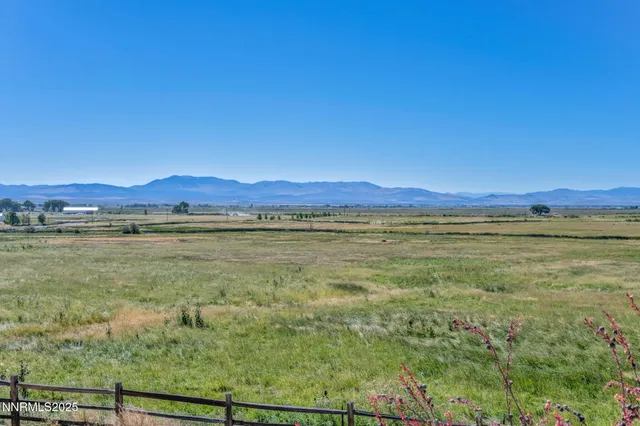 a view of an ocean and mountain