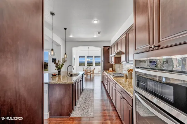 a view of a kitchen with appliances