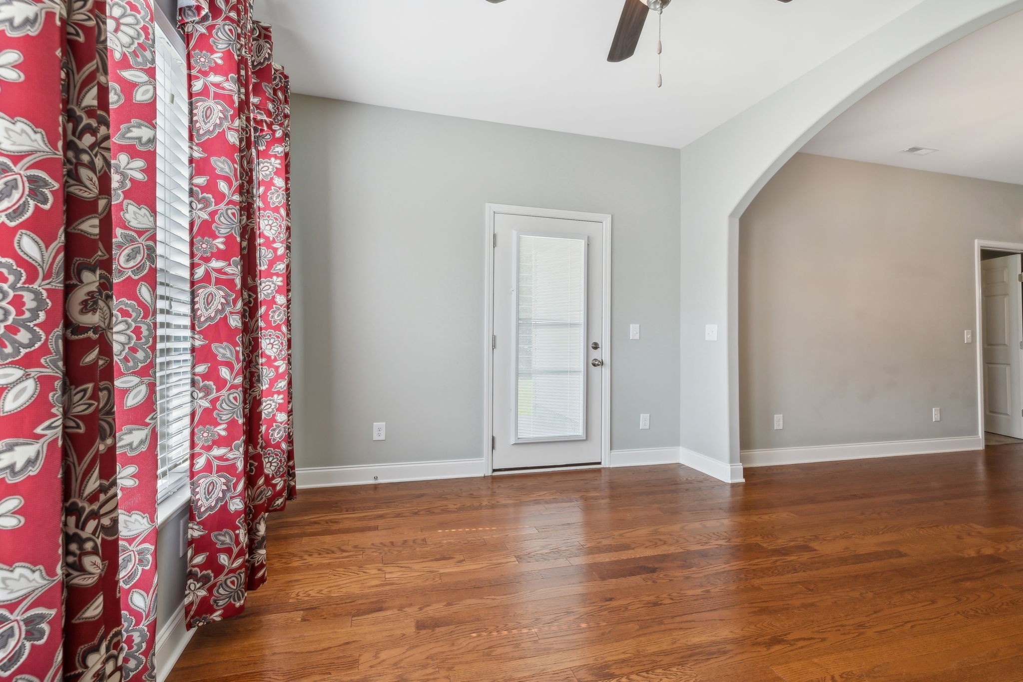 1229 Mayflower Way Lebanon, TN 37087 - Photo 23 of 42 wooden floor in an empty room with a window