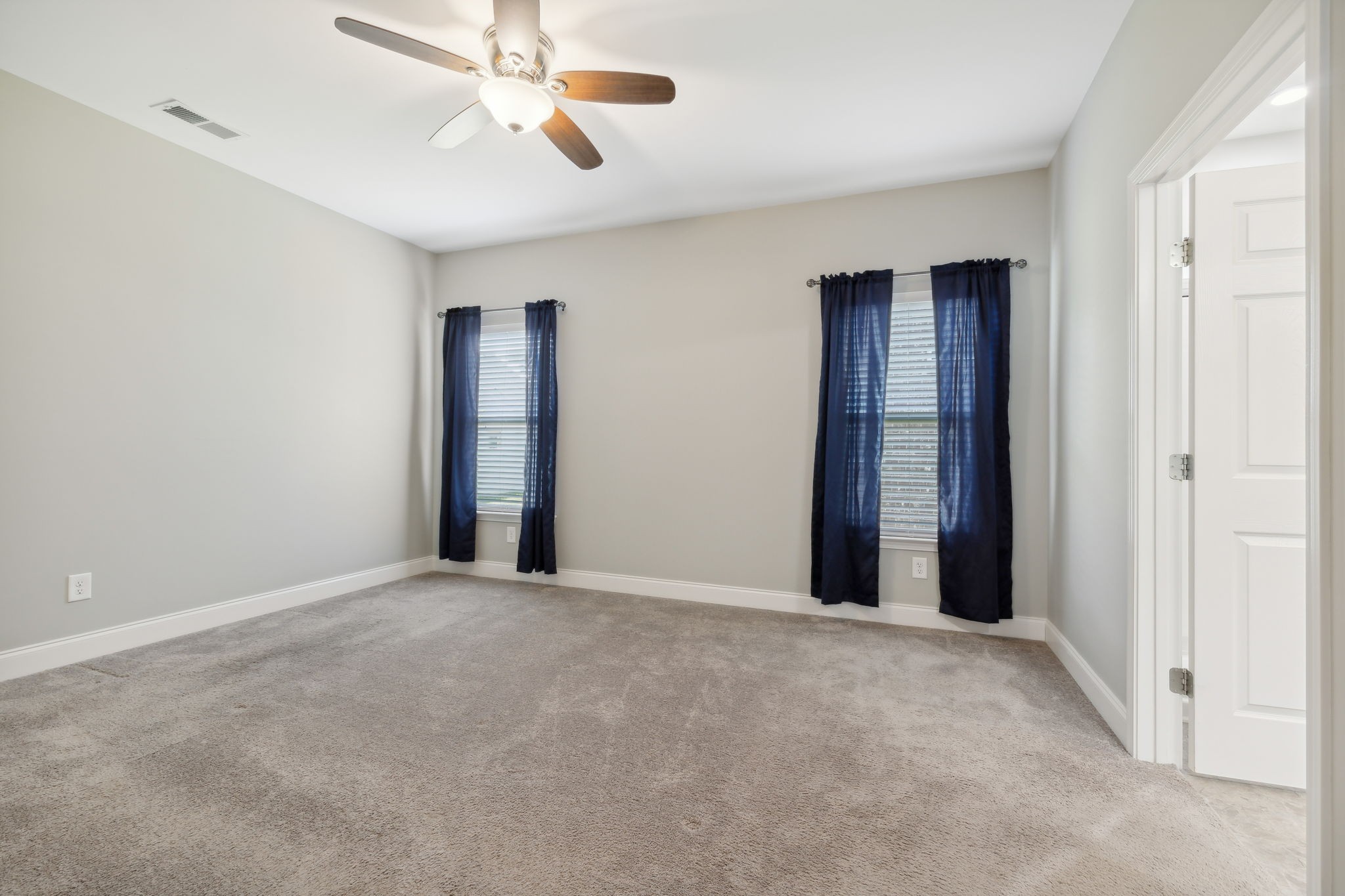 1229 Mayflower Way Lebanon, TN 37087 - Photo 25 of 42 a view of an empty room with a ceiling fan