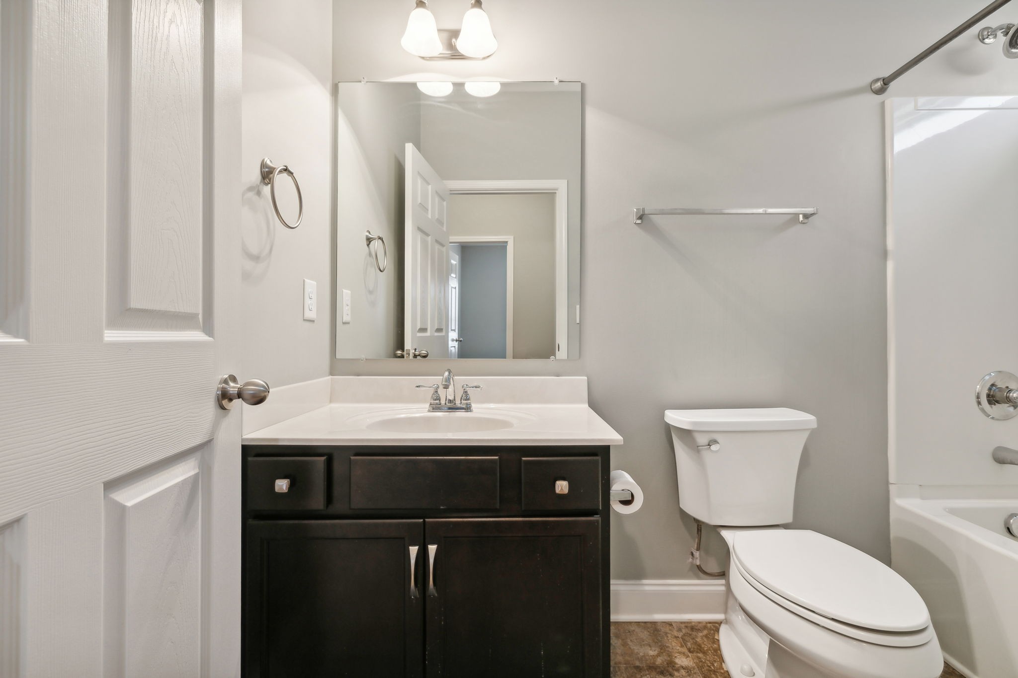 1229 Mayflower Way Lebanon, TN 37087 - Photo 30 of 42 a bathroom with a toilet sink and mirror