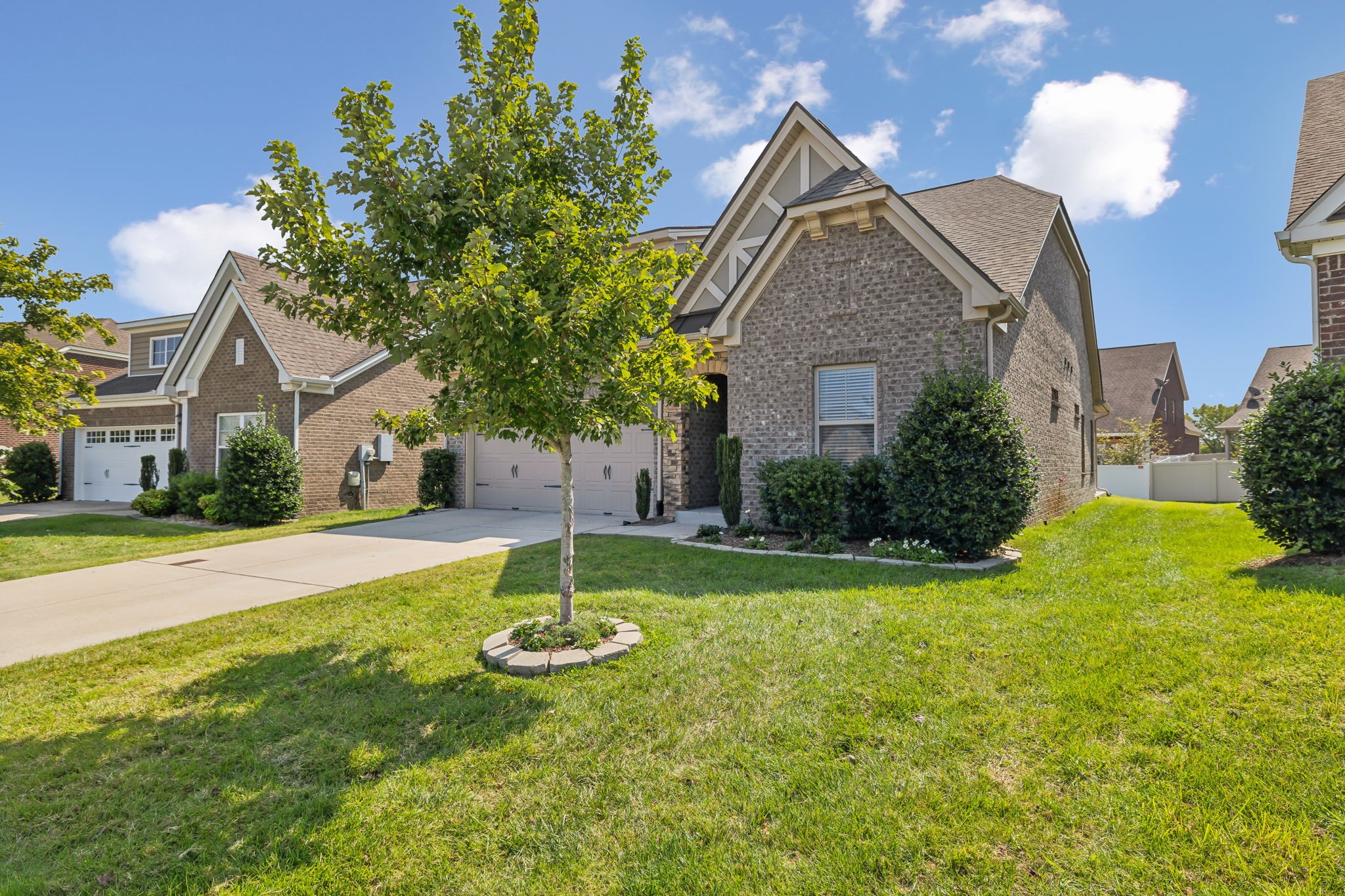 1229 Mayflower Way Lebanon, TN 37087 - Photo 3 of 42 a view of a house with a yard and a tree