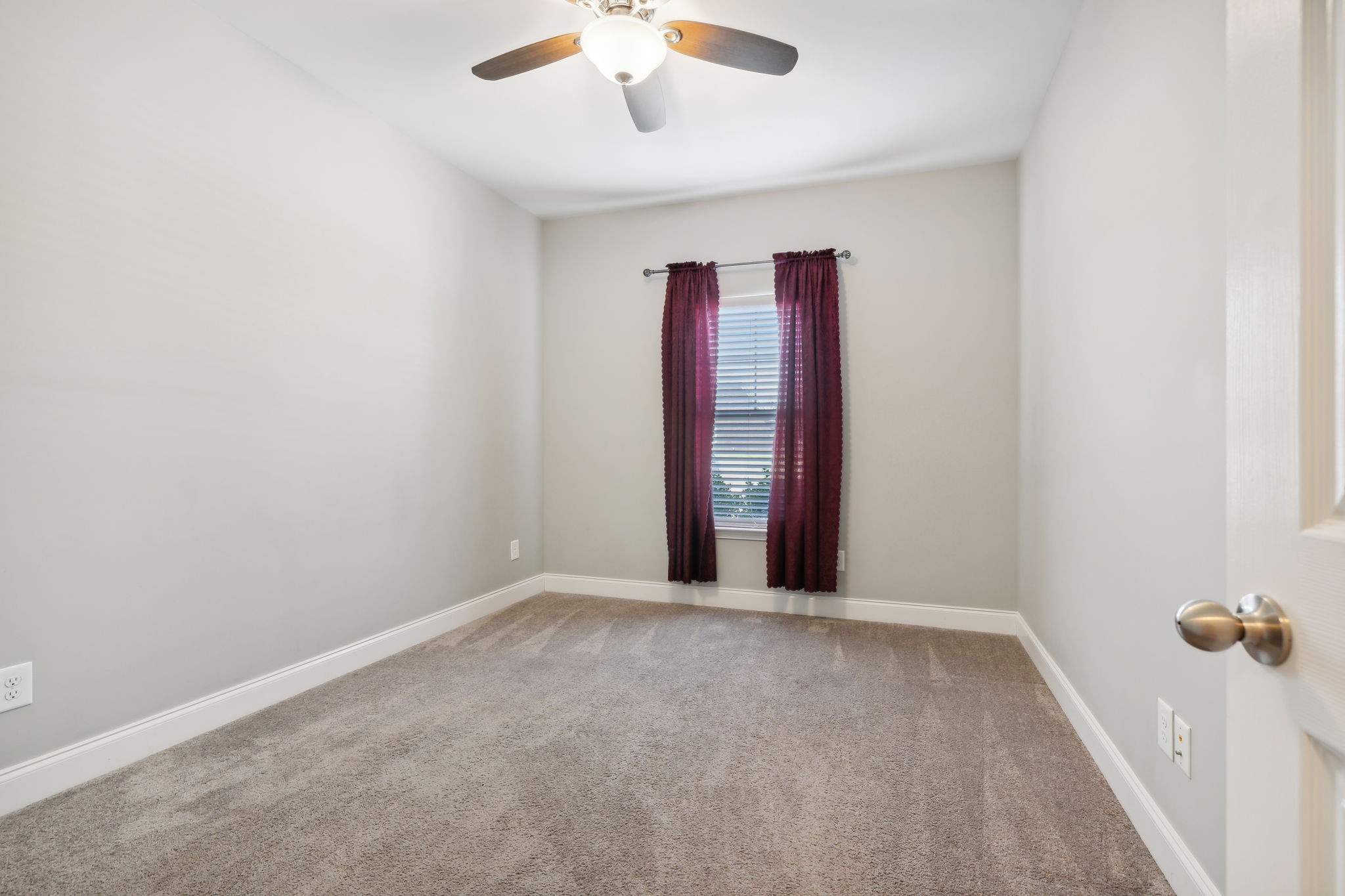 1229 Mayflower Way Lebanon, TN 37087 - Photo 33 of 42 an empty room with windows and fan