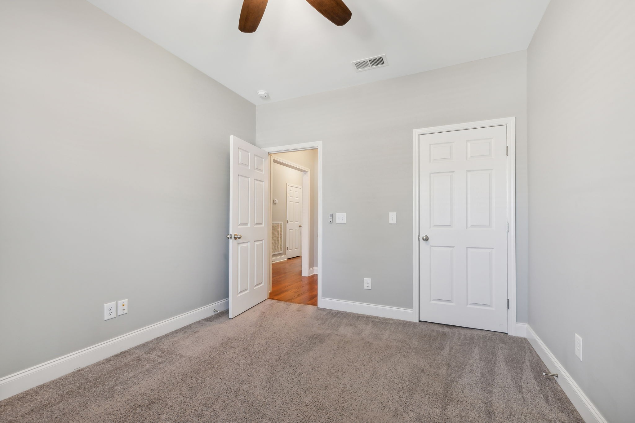 1229 Mayflower Way Lebanon, TN 37087 - Photo 35 of 42 an empty room with ceiling fan and window