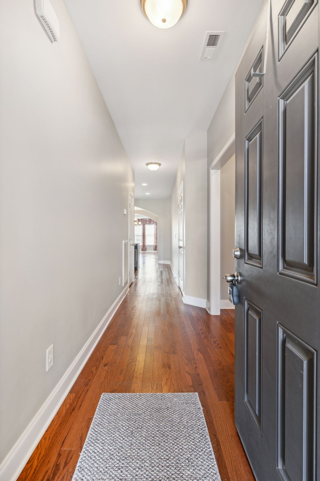 1229 Mayflower Way Lebanon, TN 37087 - Photo 39 of 42 a view of a hallway with wooden floor