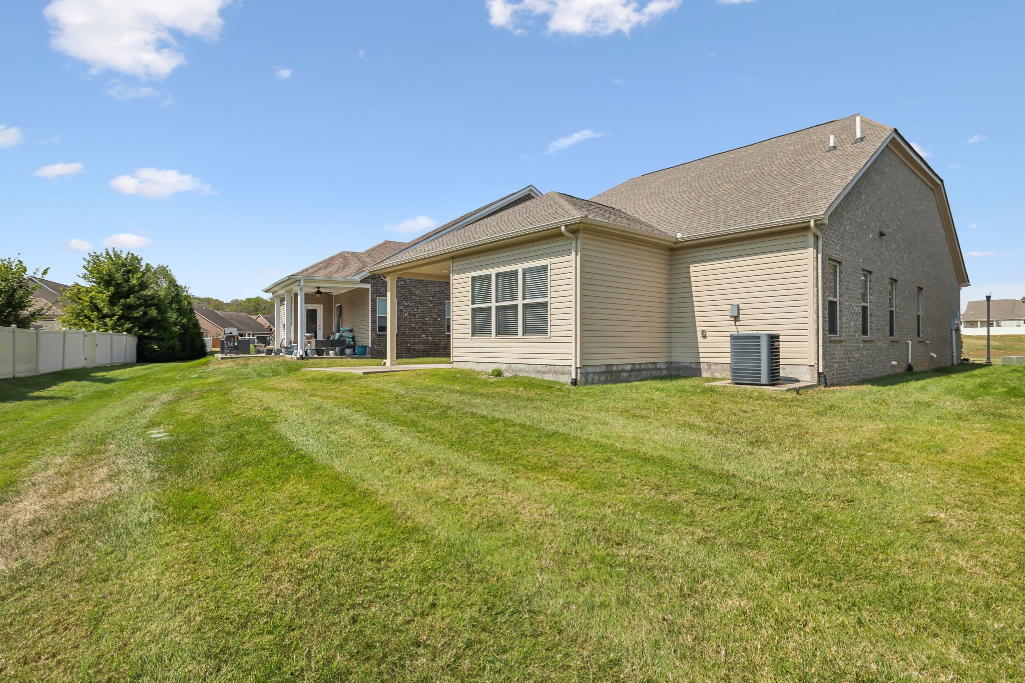 1229 Mayflower Way Lebanon, TN 37087 - Photo 4 of 42 a view of a house with a yard and garage
