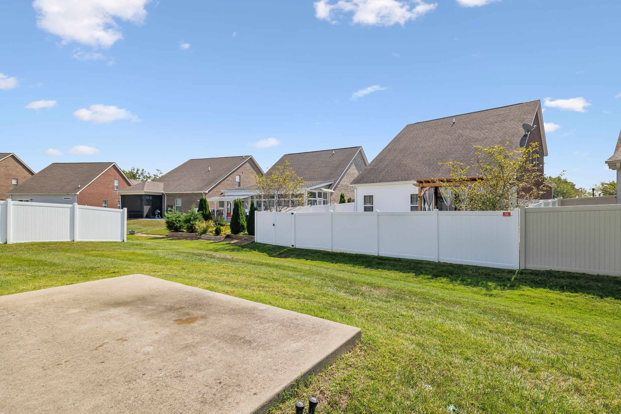 1229 Mayflower Way Lebanon, TN 37087 - Photo 9 of 42 a view of a house with a big yard and a large tree