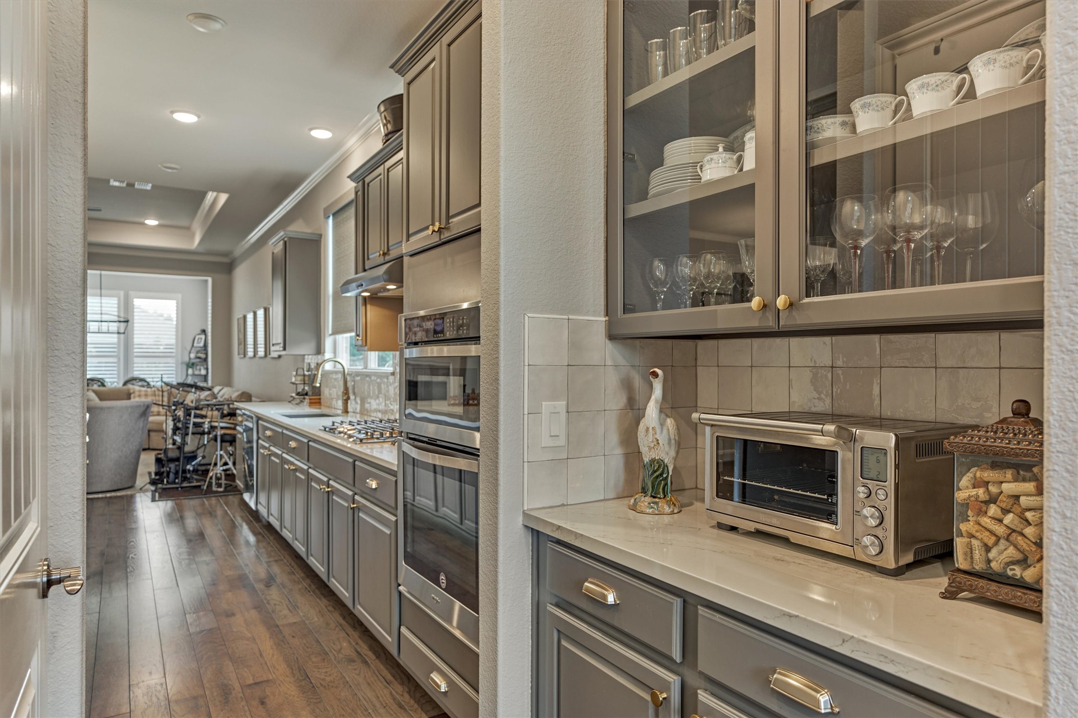 108 Wild Wick Way Spring, TX 77382 - Photo 15 of 44 The Pantry Area Offers Additional Cabinet Storage And Counterspace; It Could Serve As A Drink Station When Entertaining Or As A Coffee Bar In The Morning; There Is Also A Large Walk-in Pantry On The Opposite Side.