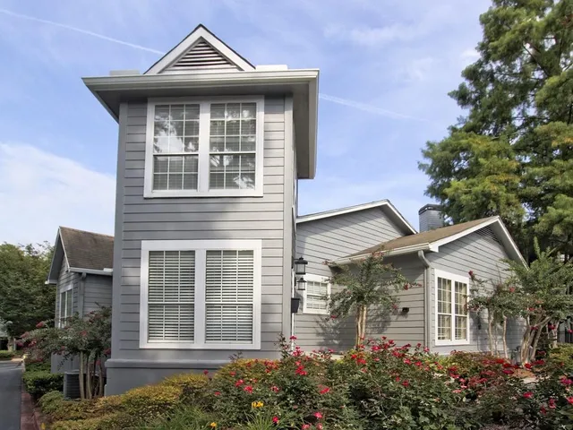 front view of a house with a garden