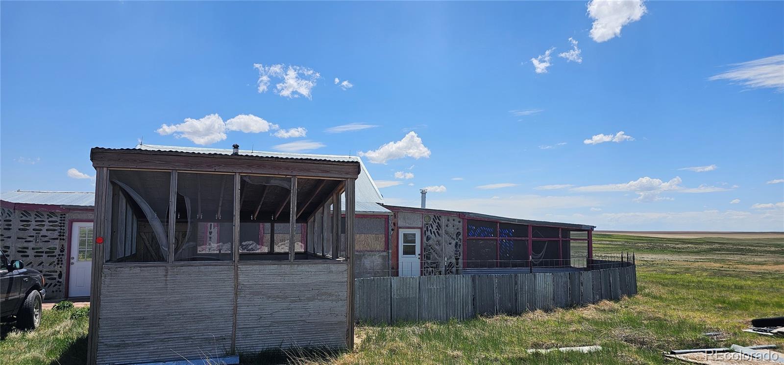 Wa County Road Cope, CO 80812 - Photo 12 of 48 a view of a house with a patio