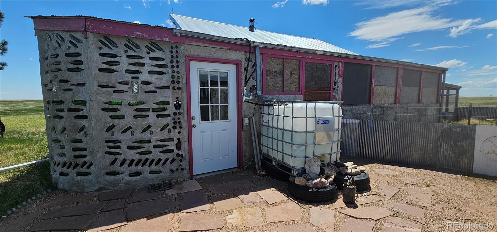 Wa County Road Cope, CO 80812 - Photo 14 of 48 a front view of a house