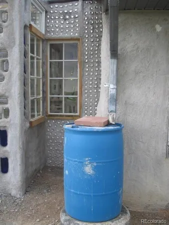 a outdoor space with patio furniture and barbeque oven