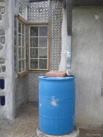 a outdoor space with patio furniture and barbeque oven