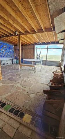 a room with lots of tables and chairs