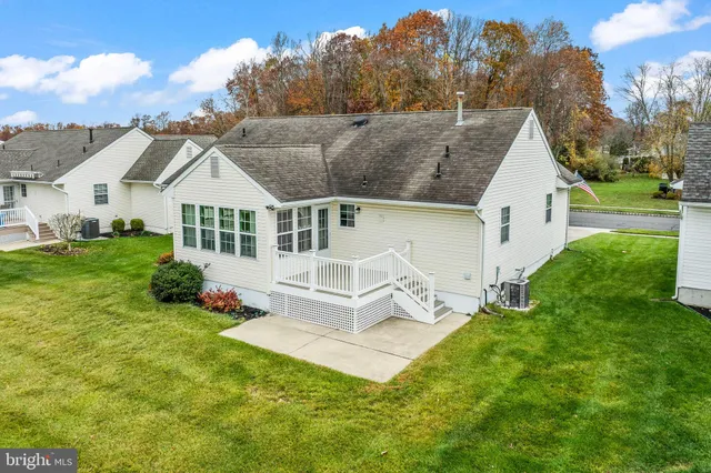 an aerial view of a house with garden