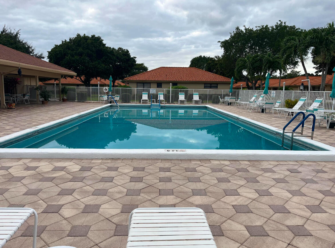 4550 Pandanus Tree Road, Unit A Boynton Beach, FL 33436 - Photo 1 of 15 SALT WATER POOL