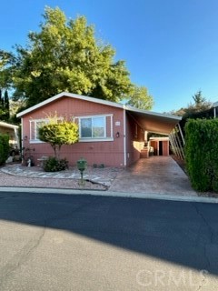 6480 Katherine Road, Unit 53 Simi Valley, CA 93063 - Photo 1 of 1 front view of a house with a yard