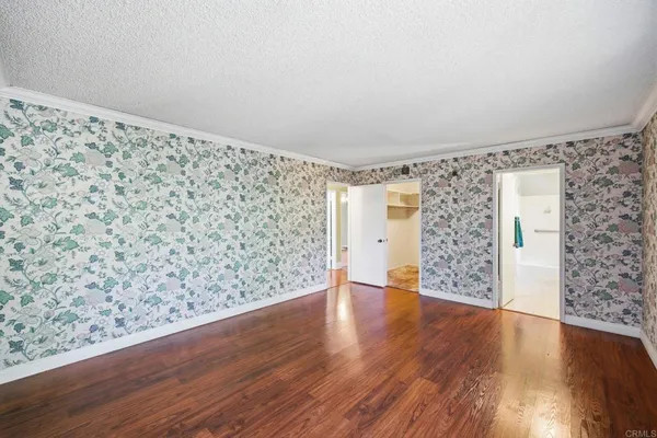 a bathroom with a sink a toilet and a shower