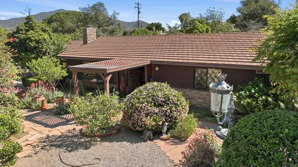 a house view with a outdoor space