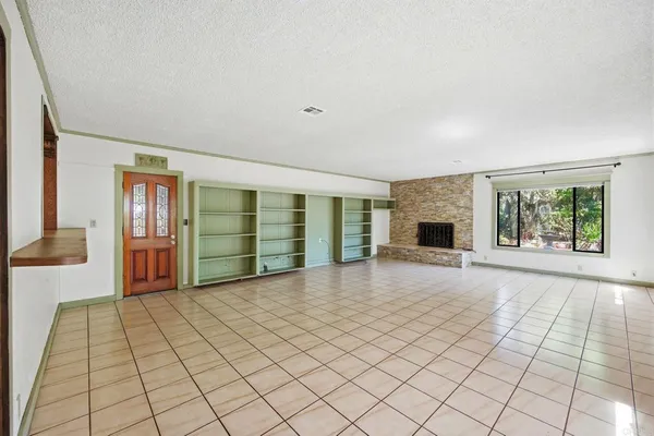 an empty room with windows