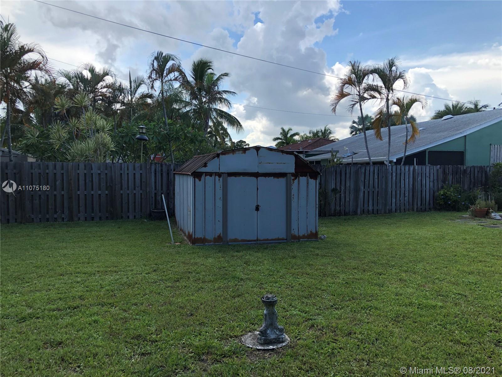1504 Funston Street Hollywood, FL 33020 - Photo 4 of 10 a view of a backyard