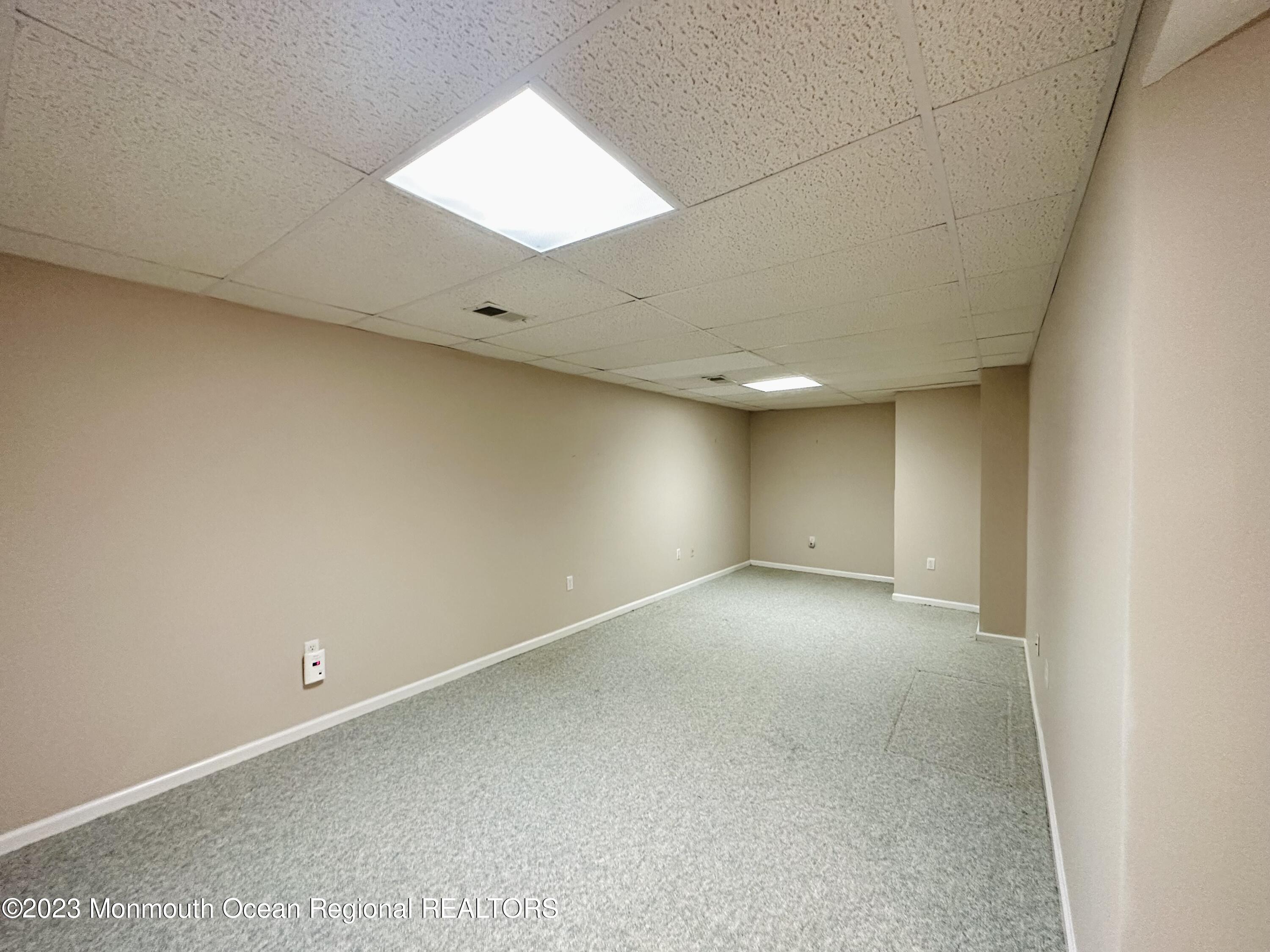 8 Alpine Road, Unit 197 Holmdel, NJ 07733 - Photo 14 of 18 a view of an empty room
