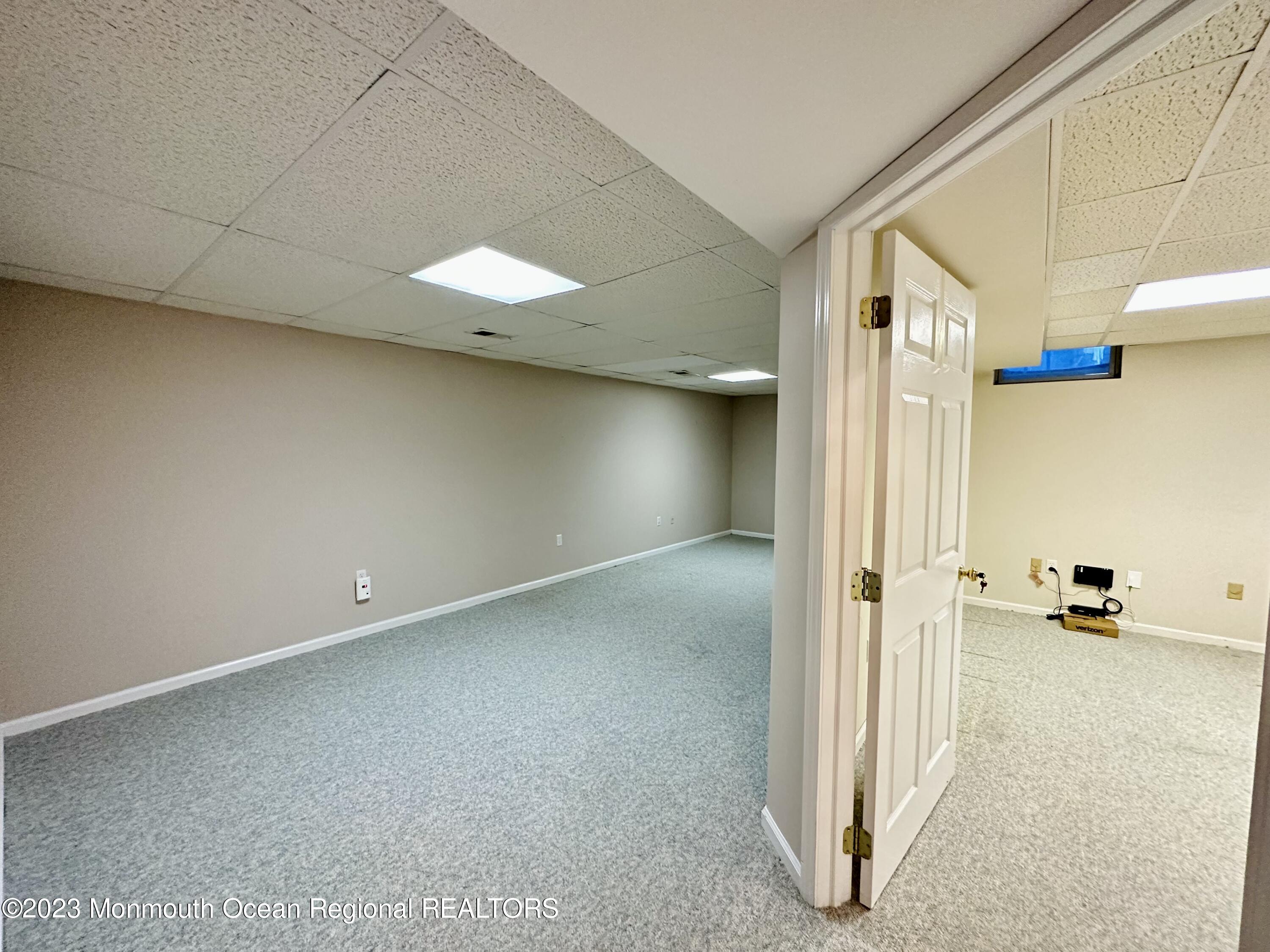 8 Alpine Road, Unit 197 Holmdel, NJ 07733 - Photo 16 of 18 a view of a room with a hallway