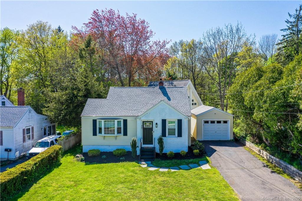 77 Barbara Road Middletown, CT 06457 - Photo 1 of 1 a front view of a house with a yard