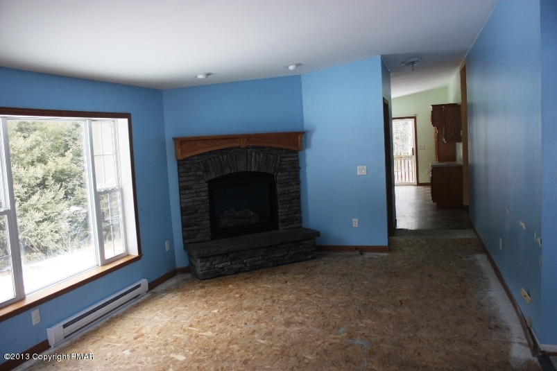 171 Blooming Grove Road Hawley, PA 18428 - Photo 5 of 17 Living room w/fireplace