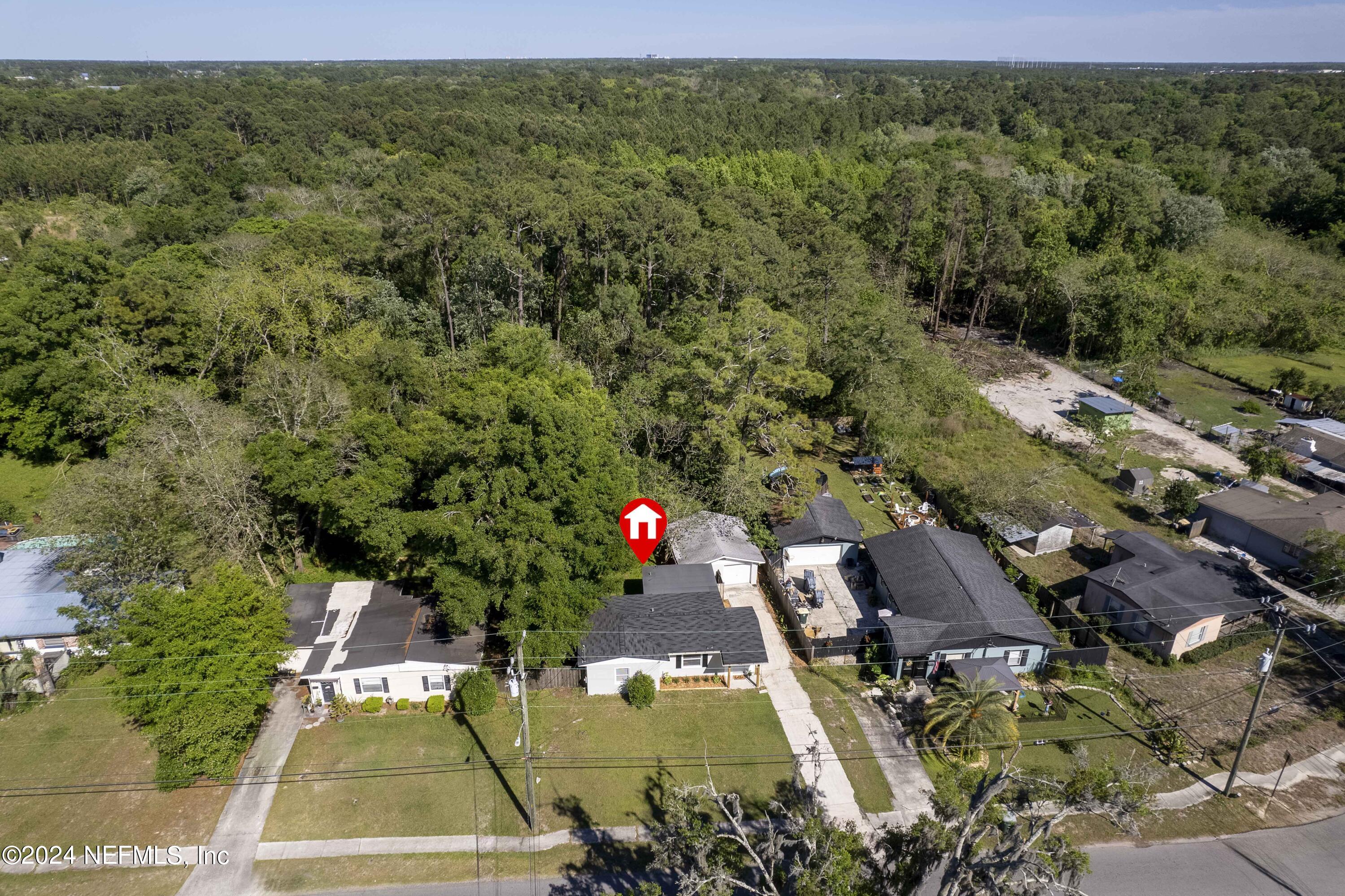 3651 Peach Drive Jacksonville, FL 32246 - Photo 24 of 25 an aerial view of a house with a yard