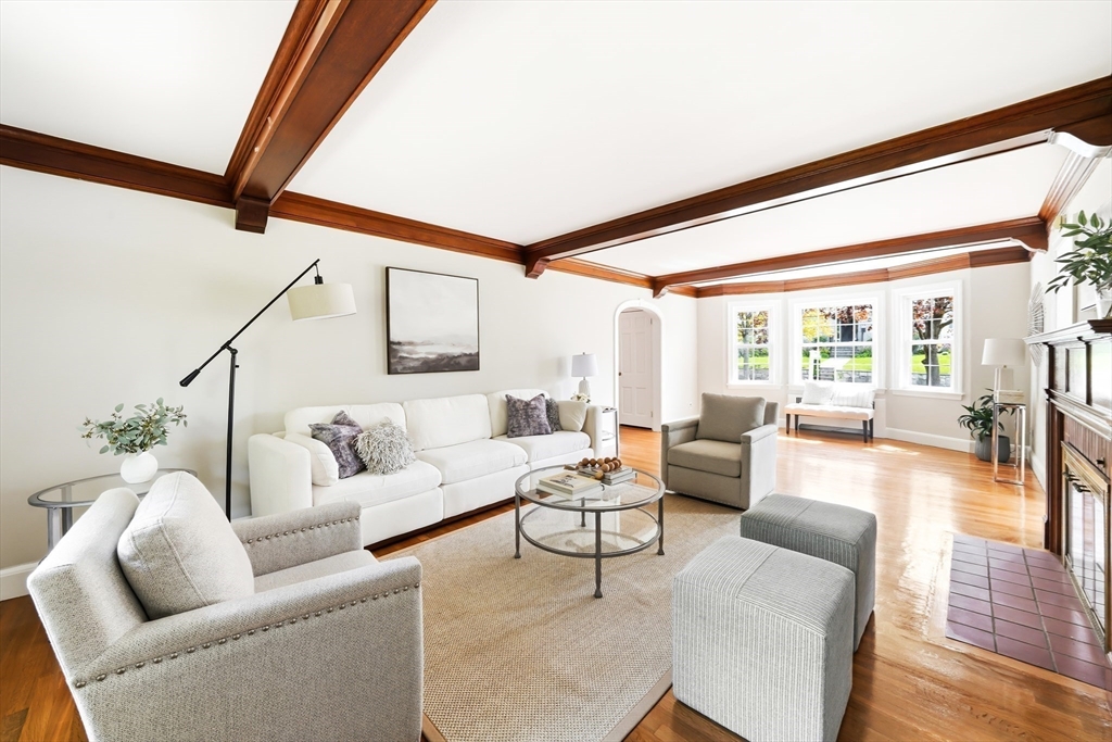 28 Homer Road Belmont, MA 02478 - Photo 8 of 41 a living room with furniture and a large window