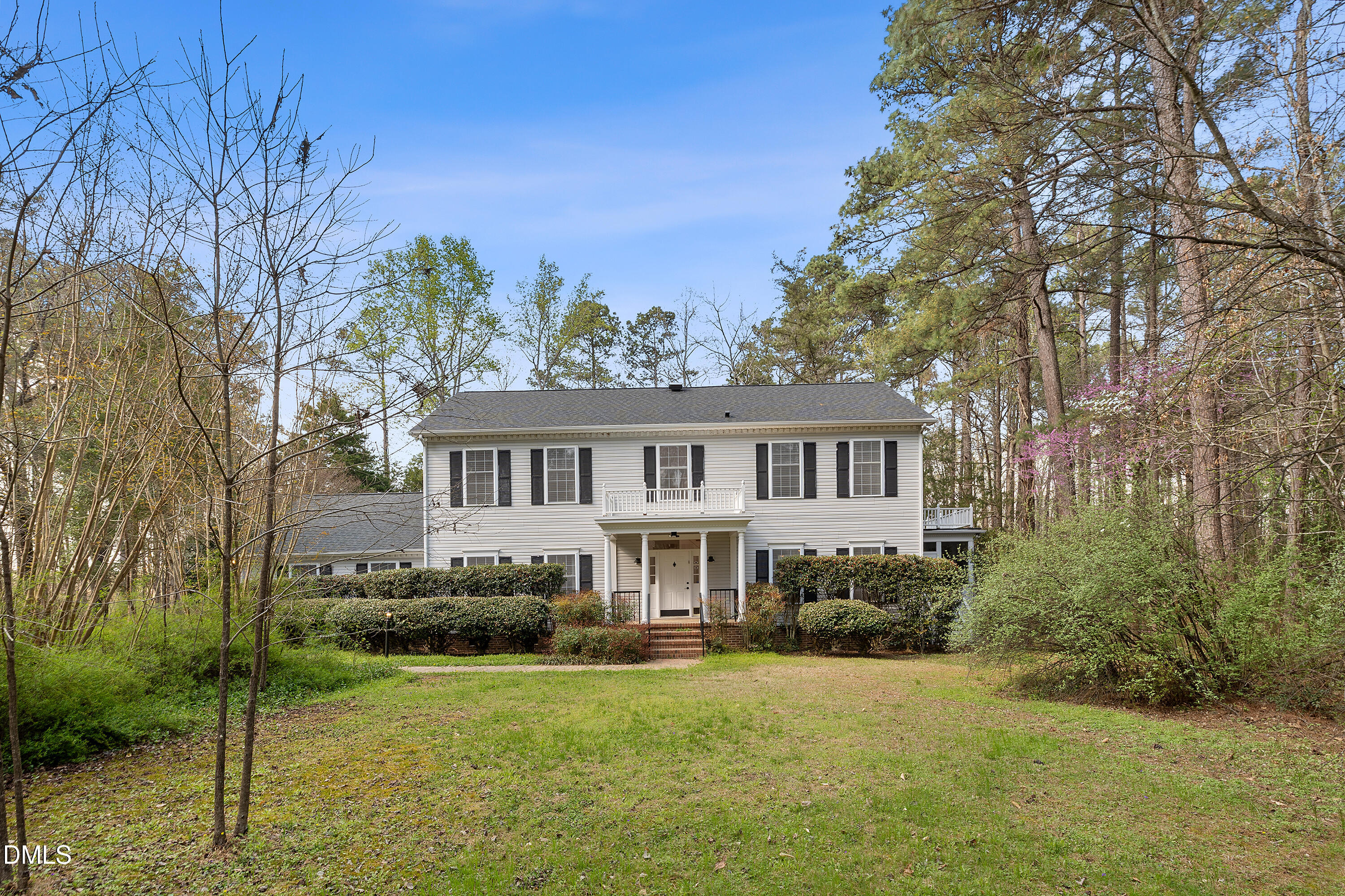 340 Andrews Store Road Pittsboro, NC 27312 - Photo 1 of 59 a view of a house with a big yard and large trees