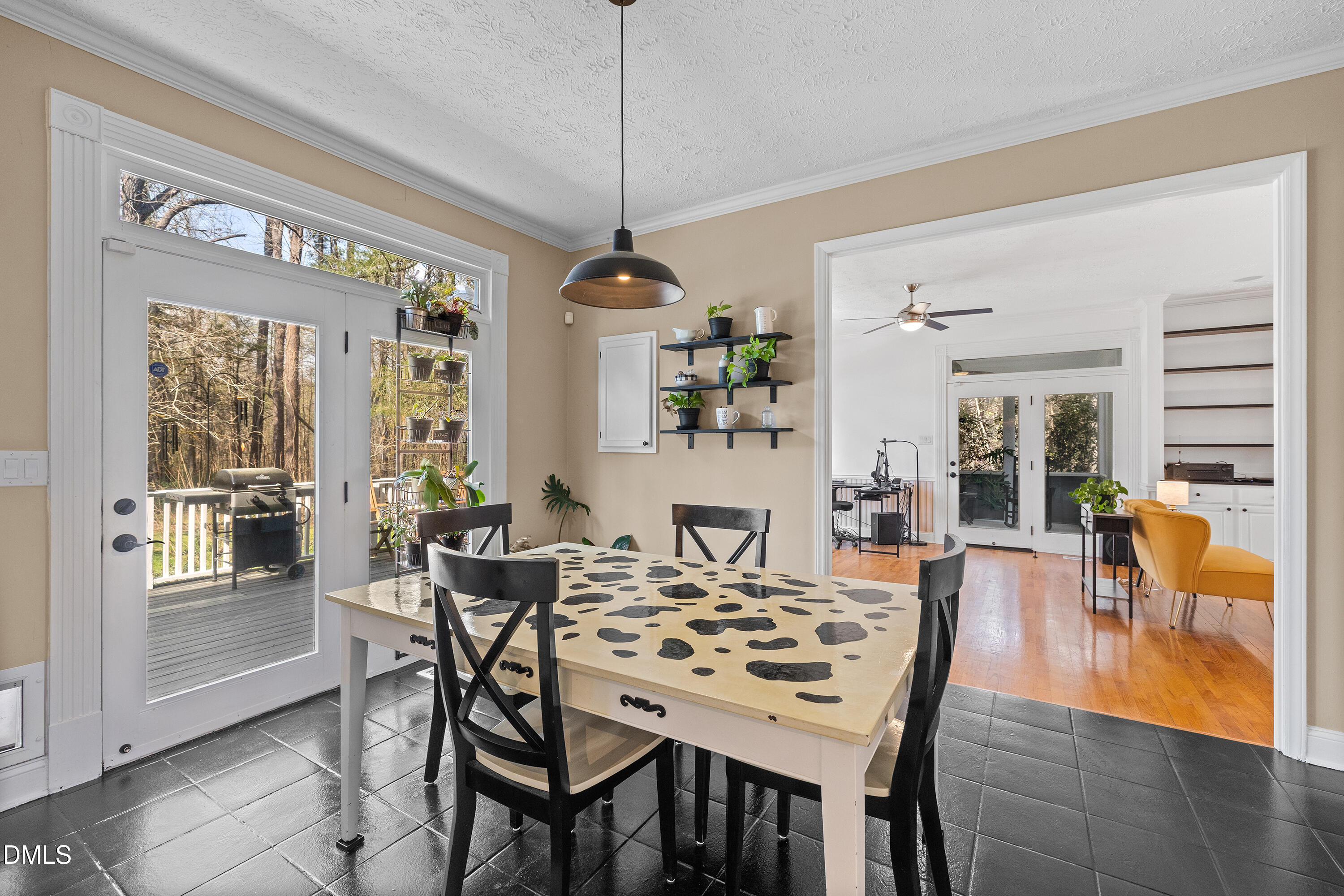 340 Andrews Store Road Pittsboro, NC 27312 - Photo 16 of 59 a view of a dining room with furniture window and wooden floor