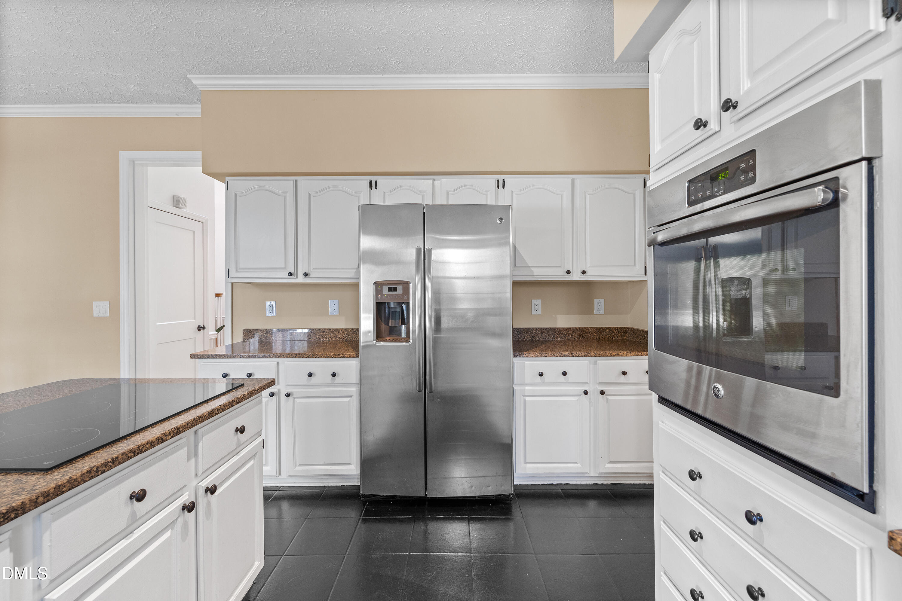 340 Andrews Store Road Pittsboro, NC 27312 - Photo 23 of 59 a kitchen with stainless steel appliances a sink stove and refrigerator
