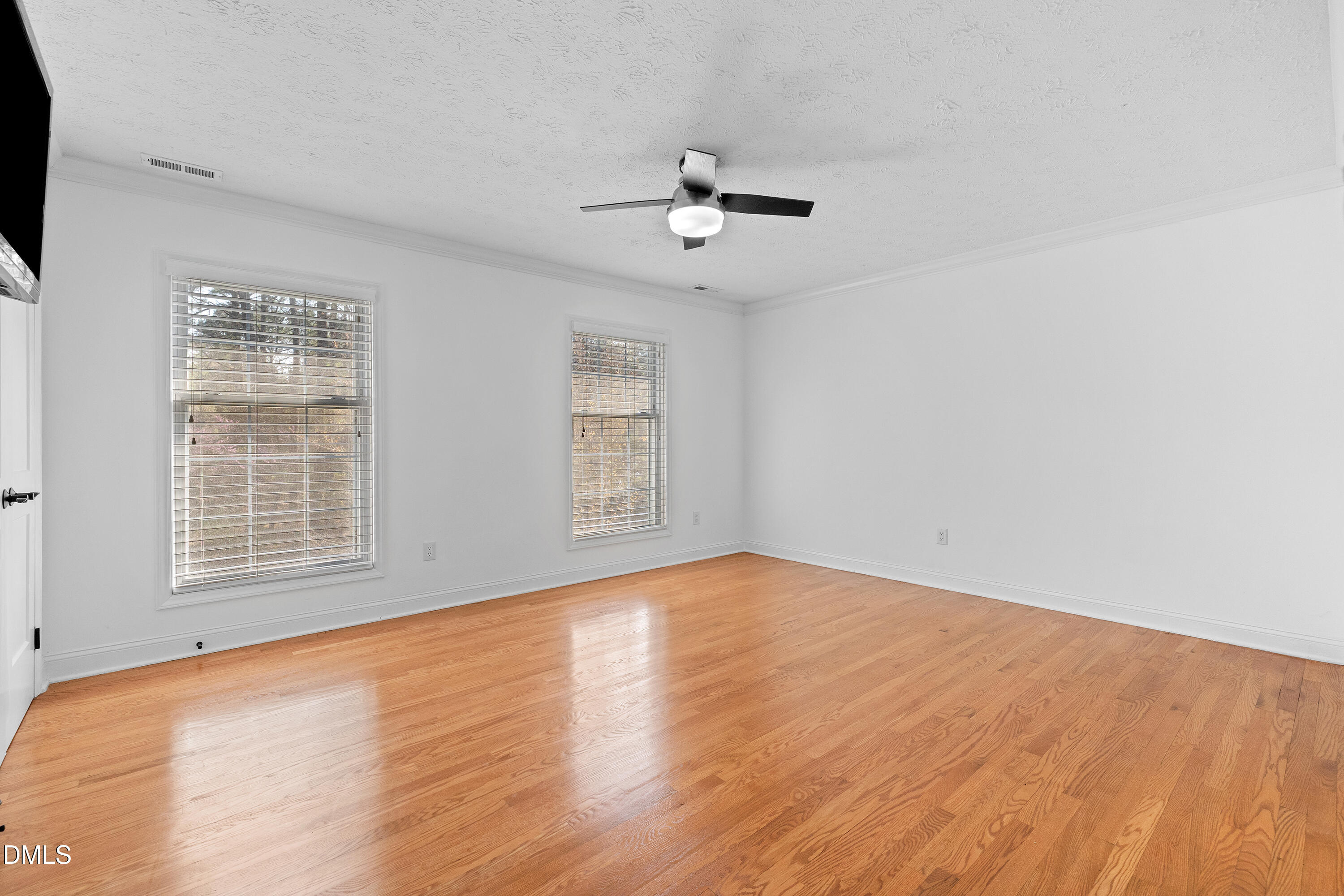 340 Andrews Store Road Pittsboro, NC 27312 - Photo 32 of 59 wooden floor in an empty room with a window