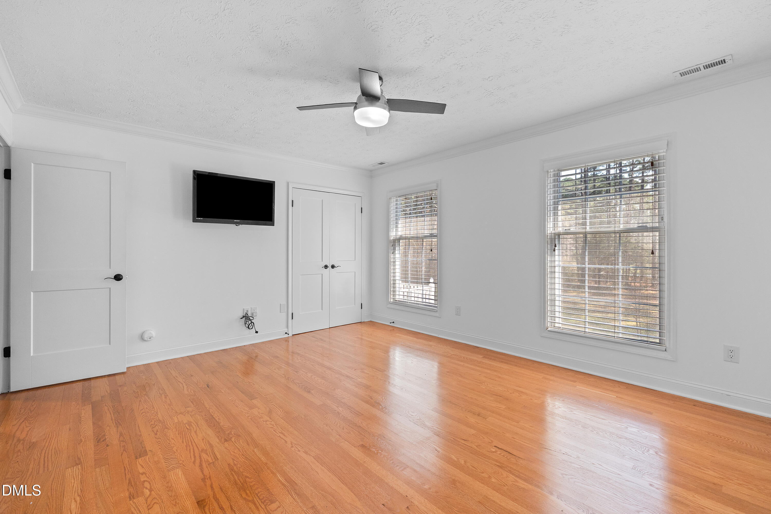 340 Andrews Store Road Pittsboro, NC 27312 - Photo 33 of 59 a view of an empty room with a window and a kitchen
