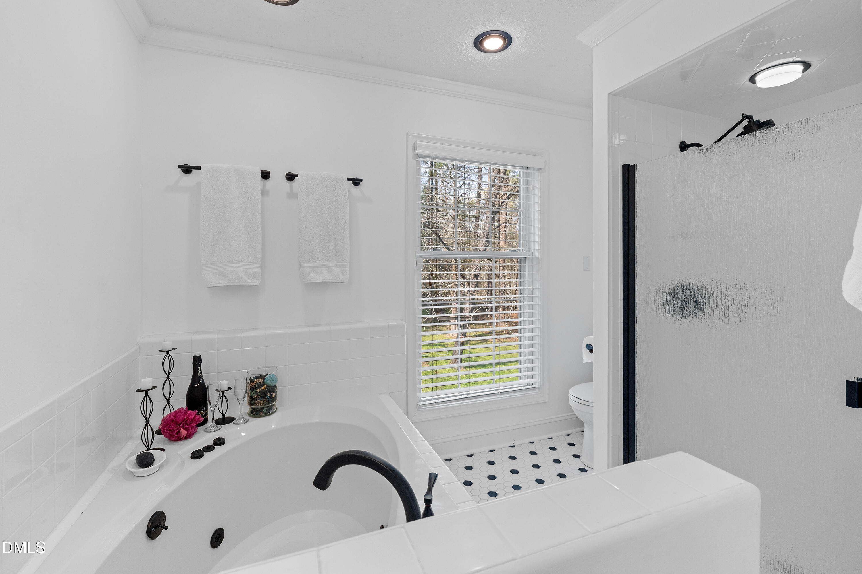 340 Andrews Store Road Pittsboro, NC 27312 - Photo 35 of 59 a bathroom with a bathtub and shower