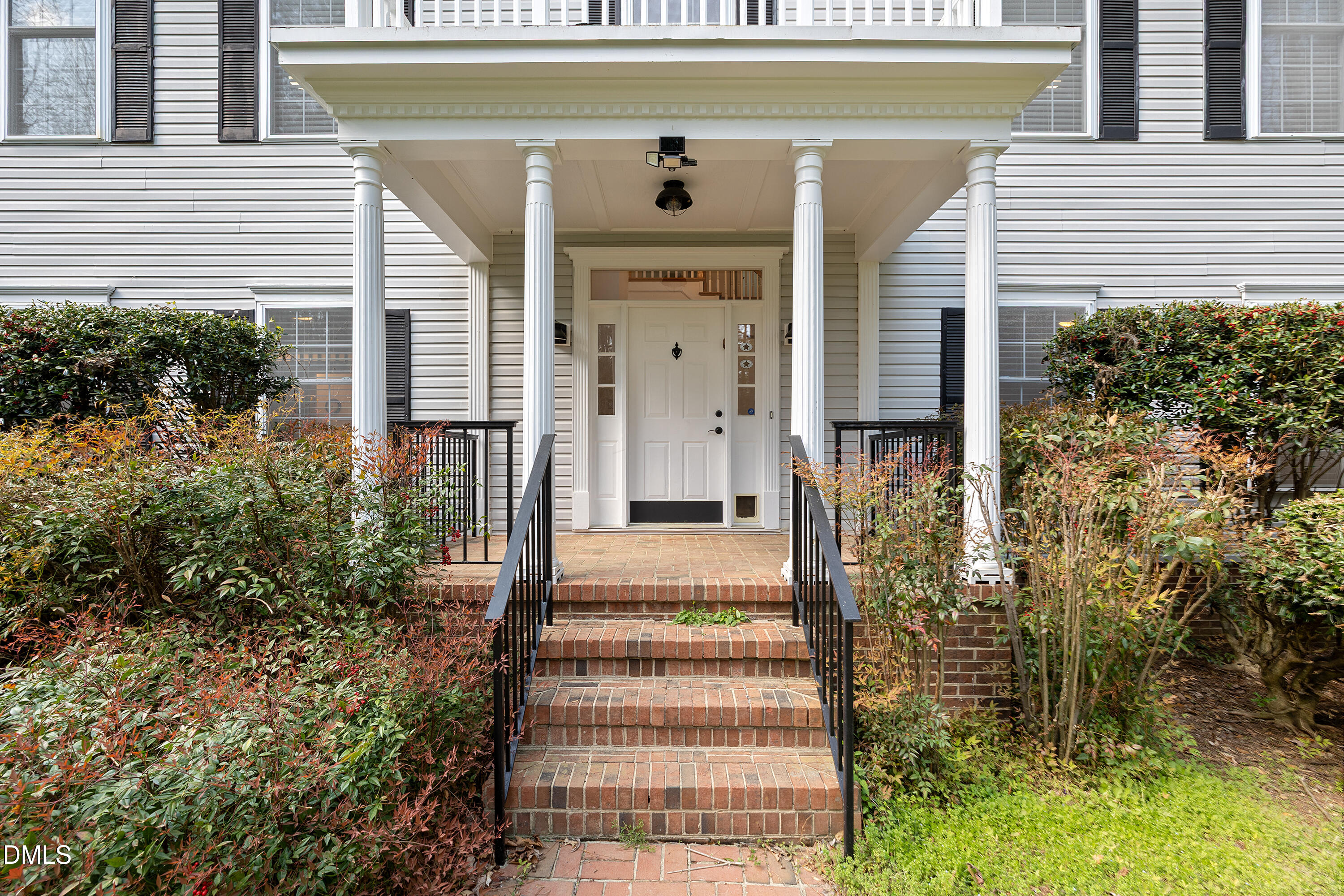 340 Andrews Store Road Pittsboro, NC 27312 - Photo 4 of 59 a front view of a house with a garden