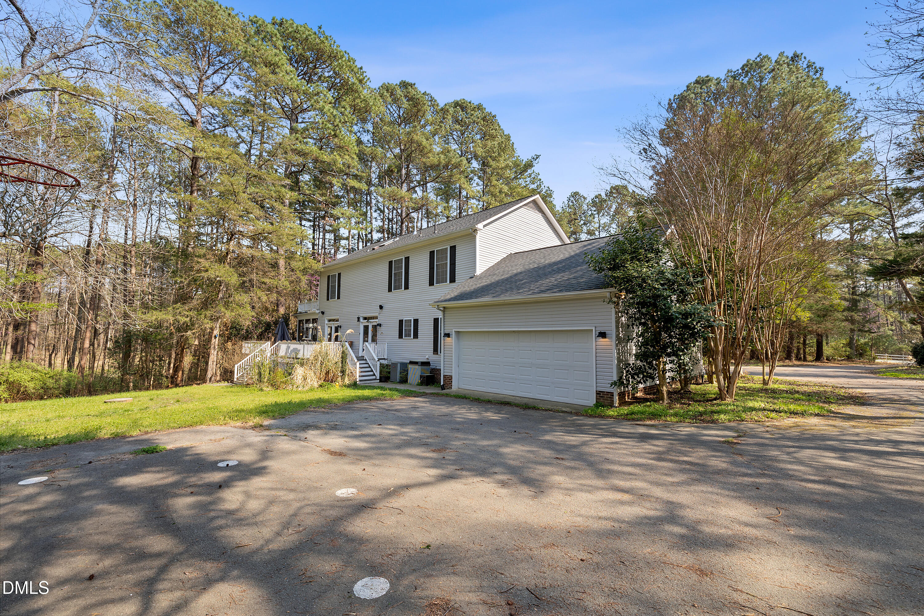 340 Andrews Store Road Pittsboro, NC 27312 - Photo 52 of 59 a view of a house with a big yard and large trees